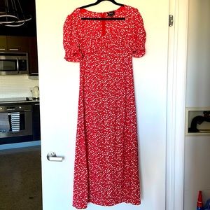 Red dress with white floral pattern dress. Never worn.